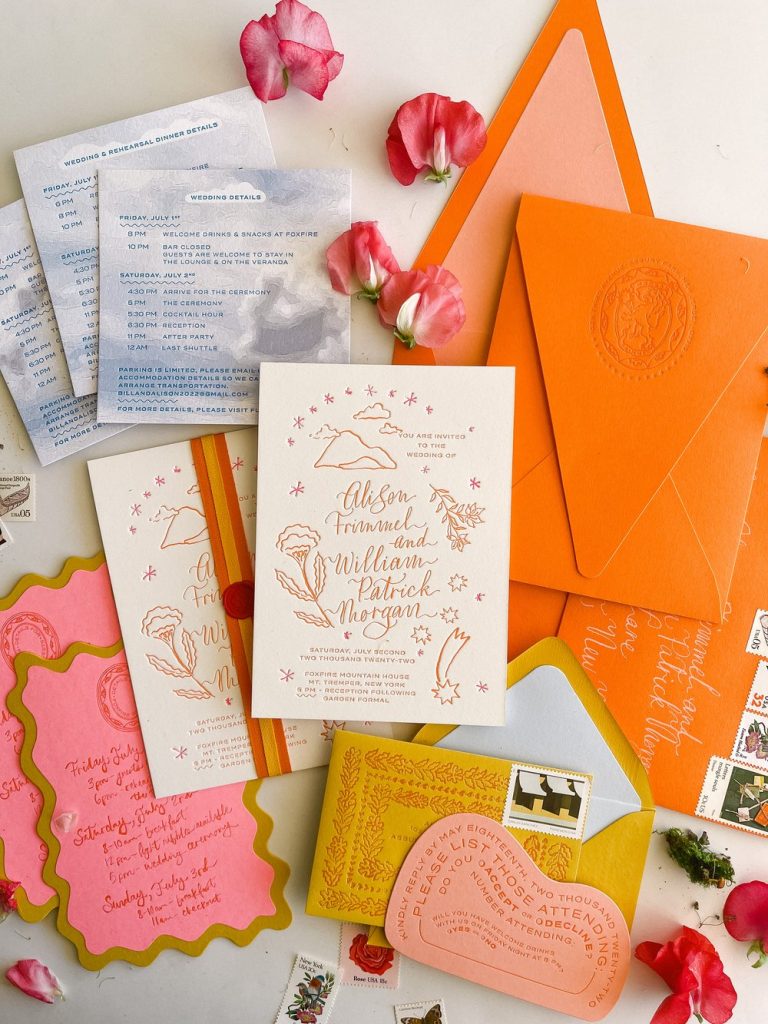 bright orange, pink and yellow wedding invitation suite